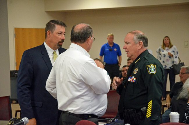 Flagler County Sheriff Rick Staly, right, with County Commission Chairman Greg Hansen, center, and County Administrator Craig Coffey before today's meeting on the Sheriff's Operations Center. (© FlaglerLive)