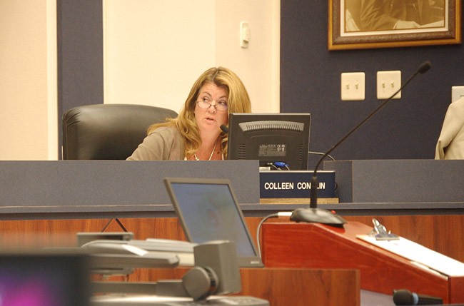 Colleen Conklin is the odd one out on this one: the Flagler County School Board member considers herself 'on the fence' regarding allowing concealed guns in schools, while her colleagues, among them Andy Dance and Sue Dickinson, pictured here, are more comfortable sticking with school resource deputies. (© FlaglerLive)