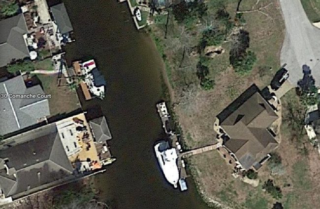 John M. Clark was living on a boat docked at 30 Comanche Court in Palm Coast.