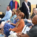 The Flagler Beach City Commission in a less stressful environment, at last April's dedication of a glass-crushing recycling machine. From left, Commissioner James Sherman, Devorah Phillips, Mayor Suzie Johnston, Commissioner Jane Mealy and Commission Chairman Ken Bryan. Commissioner Eric Cooley is not pictured. (© FlaglerLive)