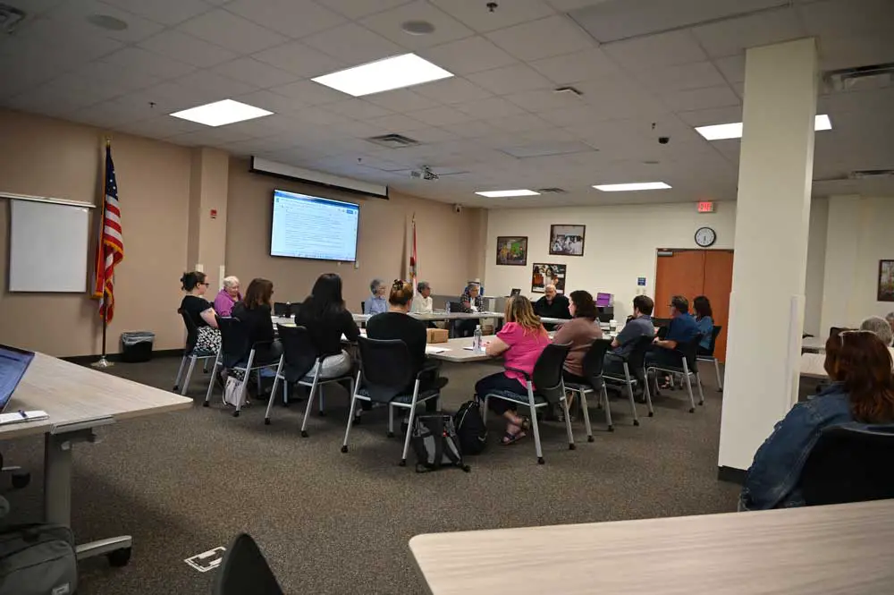 The 14-member appeals committee meeting this evening in Bunnell. It was facilitated by Lashakia Moore, the assistant superintendent. (© FlaglerLive)