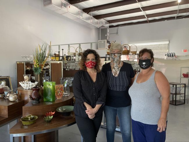 Extending cats' lives: from left, Community Cats's Holly Norris, Dabbie Coffin and Jessica Meyers, the executive director of the non-profit. (© FlaglerLive)