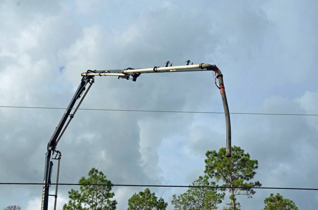 A concrete-pouring boom. (© FlaglerLive)