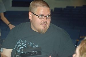 Matanzas percussion teacher Jared Allen is conducting a 20-piece live pit orchestra. 