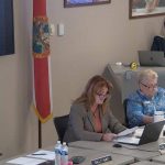Board member Colleen Conklin, second from left, explaining the ramifications of firing Board Attorney Kristy Gavin during a workshop this afternoon, as Gavin sat at her usual desk behind Board Chair Cheryl Massaro. (© FlaglerLive via Flagler Schools)