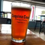 As good as it gets: a beer brewed at Coquina Coast in Flagler Beach, a microbrewery on State Road 100, just over the bridge. (© FlaglerLive)