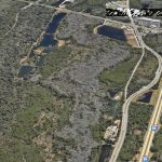 The Coquina Shores acreage seen from the north toward the south, with I-95 to the right. The development will sprawl alongside the Graham Swamp trail. (Google Earth)