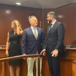 Outgoing Education Commissioner Richard Corcoran (left) and newly appointed Commissioner Manny Diaz Jr. talk Friday. (NSF)