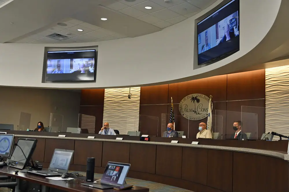 The council this morning, with one of its members and its attorney appearing by zoom, during the unremarkable appointment of a commission that will redistrict the city's voting districts in the next 120 days. (© FlaglerLive)