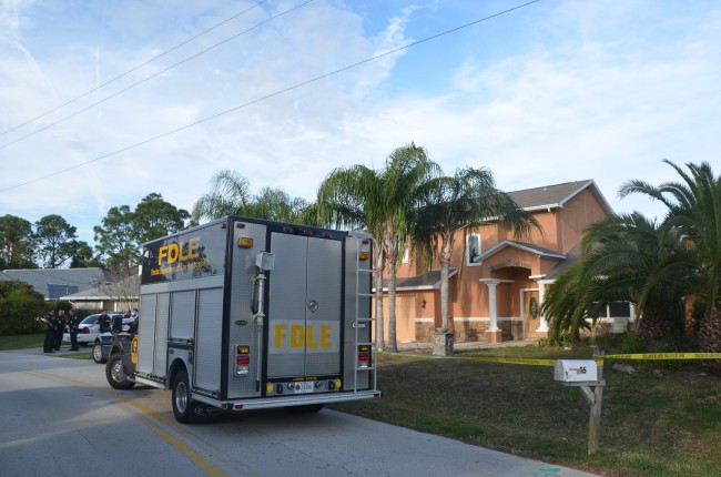 The scene at Covington Lane after Dennie Cayton's body was discovered on Jan. 11. Click on the image for larger view. (© FlaglerLive)