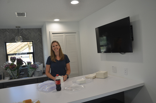 Kristi Furnari of Ripple Coworking, in one of the building's common areas. (c FlaglerLive)