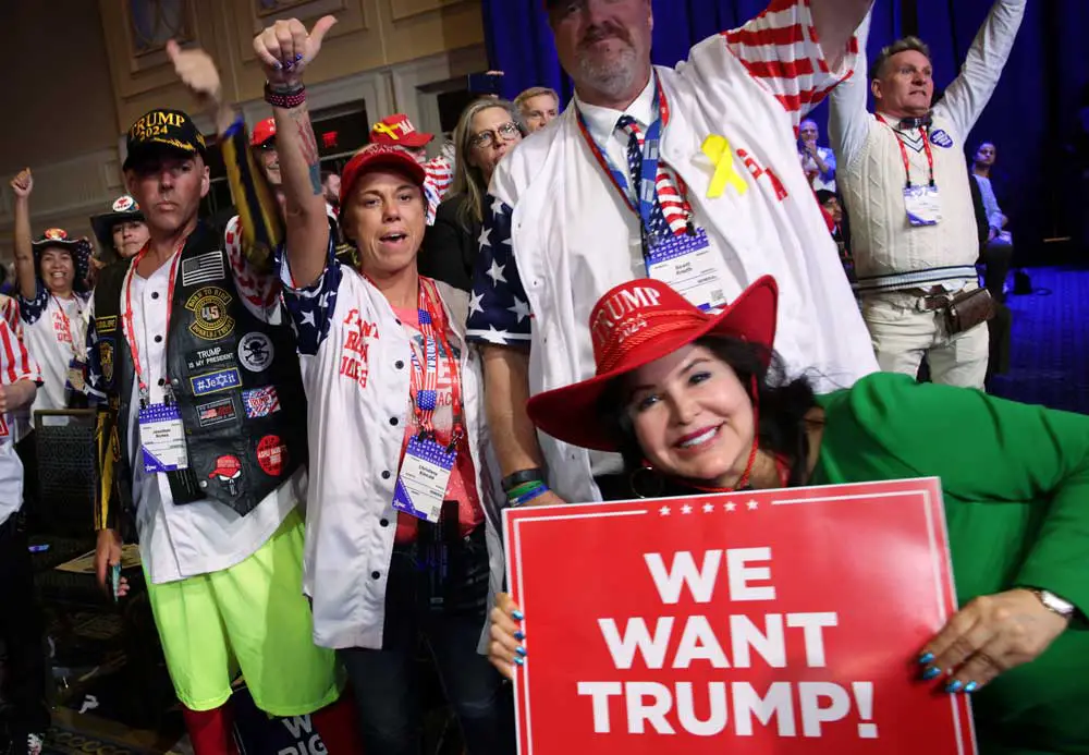 Supporters listen to former President Donald Trump at the CPAC meeting in Maryland in March 2023. 