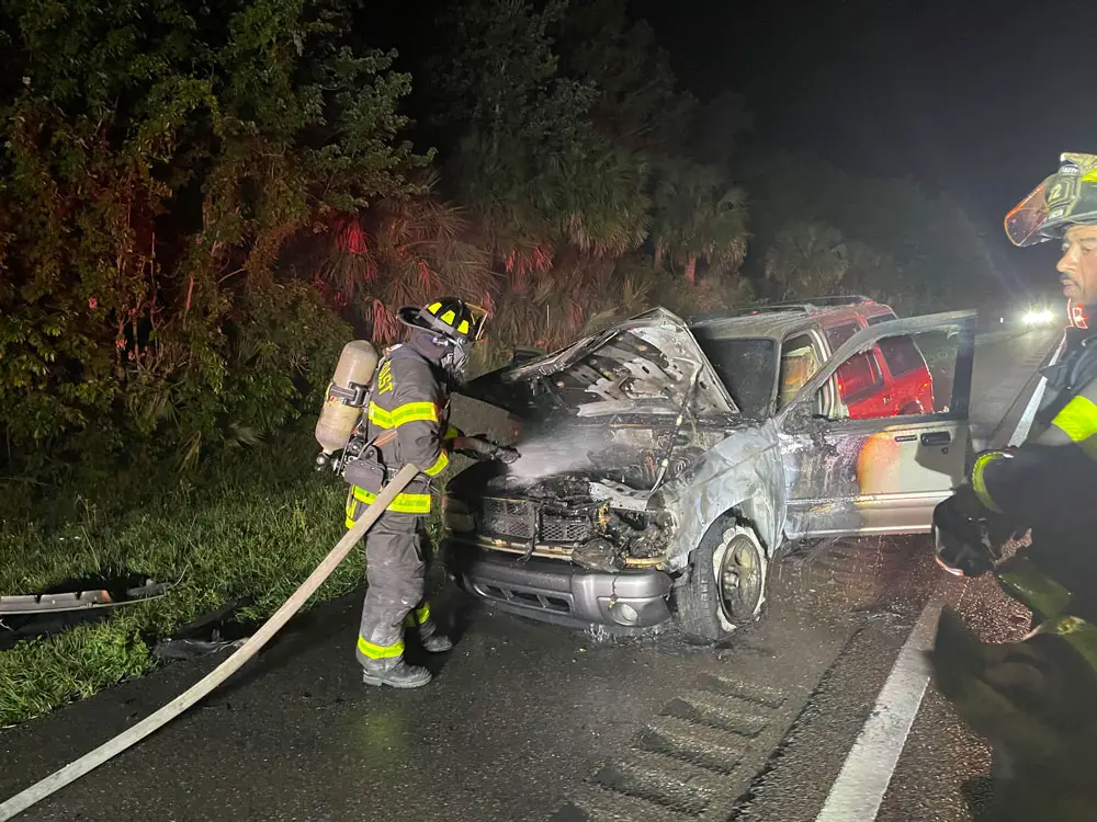 One of the vehicles was occupied by three young adults traveling south from South Carolina. Their SUV struck debris and caught on fire. The occupants were not injured. (Palm Coast Fire Department)
