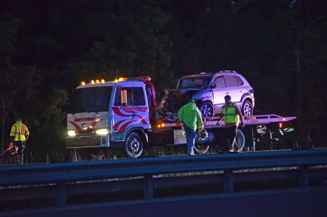 The scene of the crash on I-95 caused by a motorist going the wrong way last April. The motorist was killed. Moments earlier, he'd crossed paths with a deputy's cruiser on the exit ramp. (© FlaglerLive)