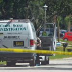 The Flagler County Sheriff's Crime Scene Investigation unit in front of 20 Blare Drive in Palm Coast nearing noon today, as it investigated the early-morning homicide there. (© FlaglerLive)