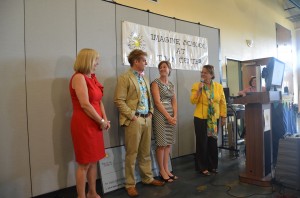 Diane Beatty, Imagine Schools' executive vice president, with Brett Cunningham, Principal Lisa O'Grady and Superintendent Janet Valentine this morning. Click on the image for larger view. (© FlaglerLive)