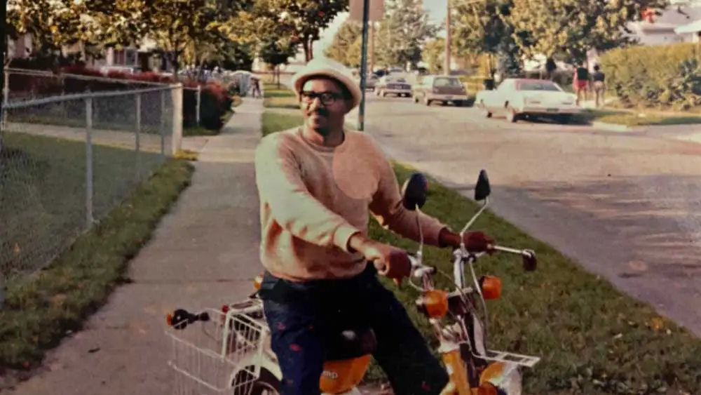 My dad in our neighborhood on our moped. (Dana James)