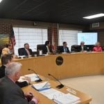 To the dismay of Commissioner John Cunningham, the Flagler Beach City Commission Thursday night reasserted its confidence in City Manager Dale Martin, in the foreground. (© FlaglerLive)