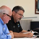 Flagler County Commissioner Andy Dance, right, keeps discovering that he and his colleagues--in this case, Dave Sullivan--aren't necessarily on the same page when it comes to rules of decorum and procedures. (© FlaglerLive)