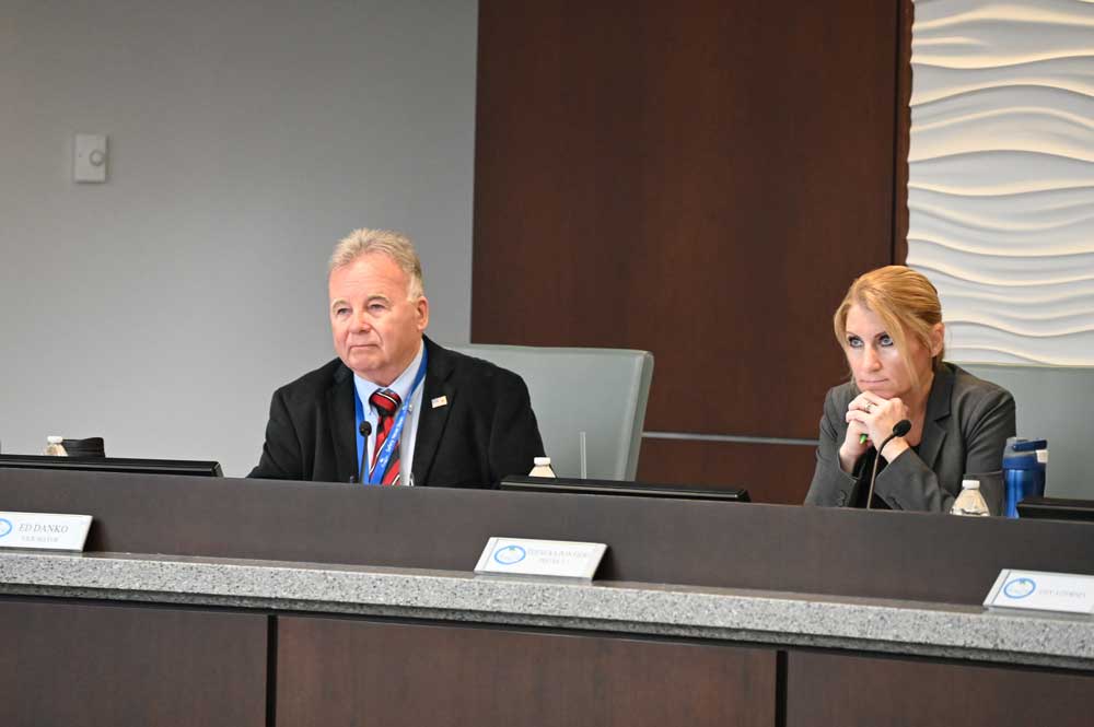 Palm Coast City Council members Ed Danko and Theresa Pontieri crafted a compromise approach to hiring the next city manager. Pontieri attended today's meeting remotely. (© FlaglerLive)