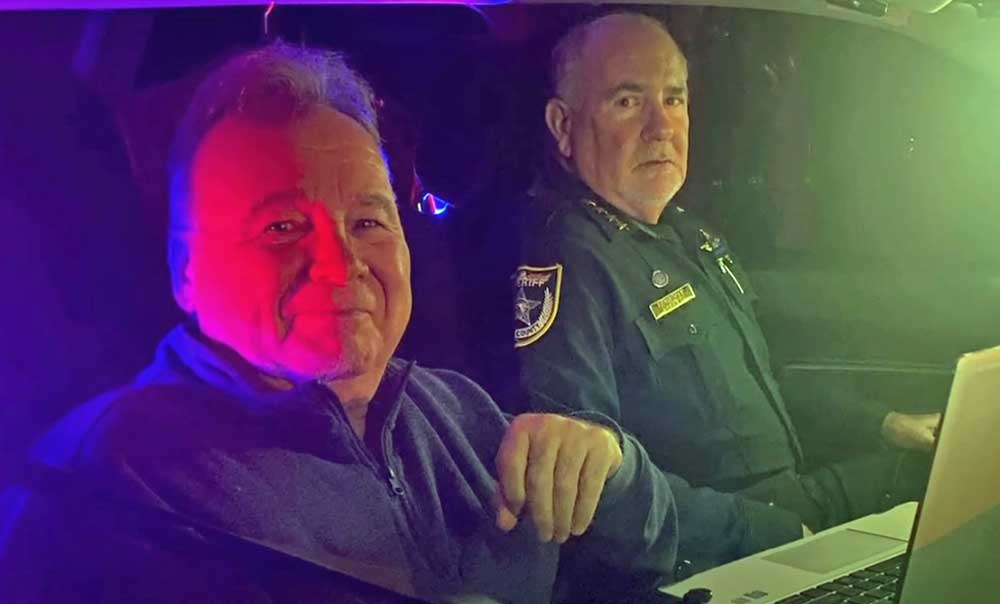 One of the two images Ed Danko uses of himself with Sheriff Rick Staly in a campaign video for Danko's race for County Commission. (YouTube)