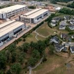 An Amazon data center sits next to a neighborhood in northern Virginia.