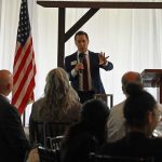 Palm Beach County State Attorney Dave Aronberg spoke at a Flagler Tiger Bay Club lunch today, facing, front and center, his ideological opposite in Sheriff Rick Staly, who was flanked by County Judges Melissa Distler and Andrea Totten. (© FlaglerLive)