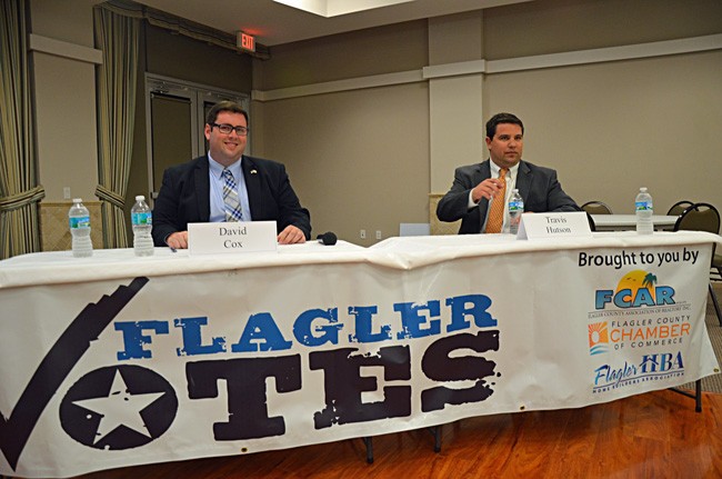 David Cox, left, the Democrat in the race for State Senate, vehemently  opposes the bill Travis Hutson is sponsoring that would allow college students 21 and older to carry concealed weapons on campus. (© FlaglerLive)