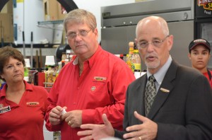 Melinda and David Hause with Firehouse Subs CEO  Don Fox at Monday's celebration. Click on the image for larger view. (© FlaglerLive)