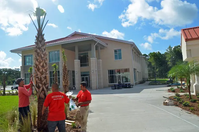 Workers were adding final touches to the new segment of Daytona State College's Palm Coast campus this week. (© FlaglerLive)