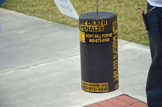 The makeshift bell that opponents of the death penalty ring during vigils at every execution in Starke, the state prison where inmates are executed. Click on the image for larger view. (© FlaglerLive)