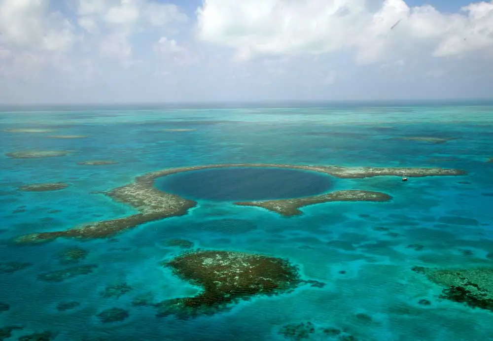 Deep ‘blue holes,’ like this one off Belize, can collect evidence of hurricanes. The TerraMar Project, CC BY