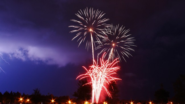 A photograph Joe Delarosby shot of the Palm Coast fireworks on July 4, 2012. Notice the lightning to the left. Click on the image for larger view. (© Joe Delarosby for FlaglerLive) 