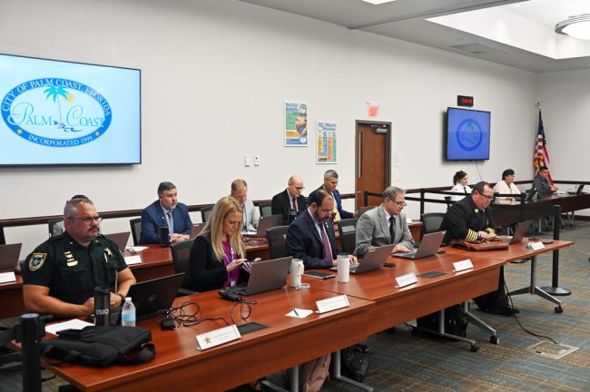 DeLorenzo, third from left in the front row, among the city's executive team at a recent Council meeting. (© FlaglerLive)