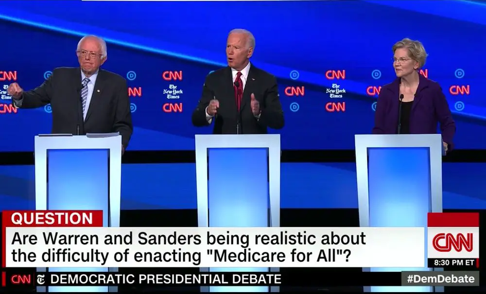 Bernie Sanders, Joe Biden and Elizabeth Warren during Tuesday's Democratic presidential debate on CNN. (© FlaglerLive via CNN)