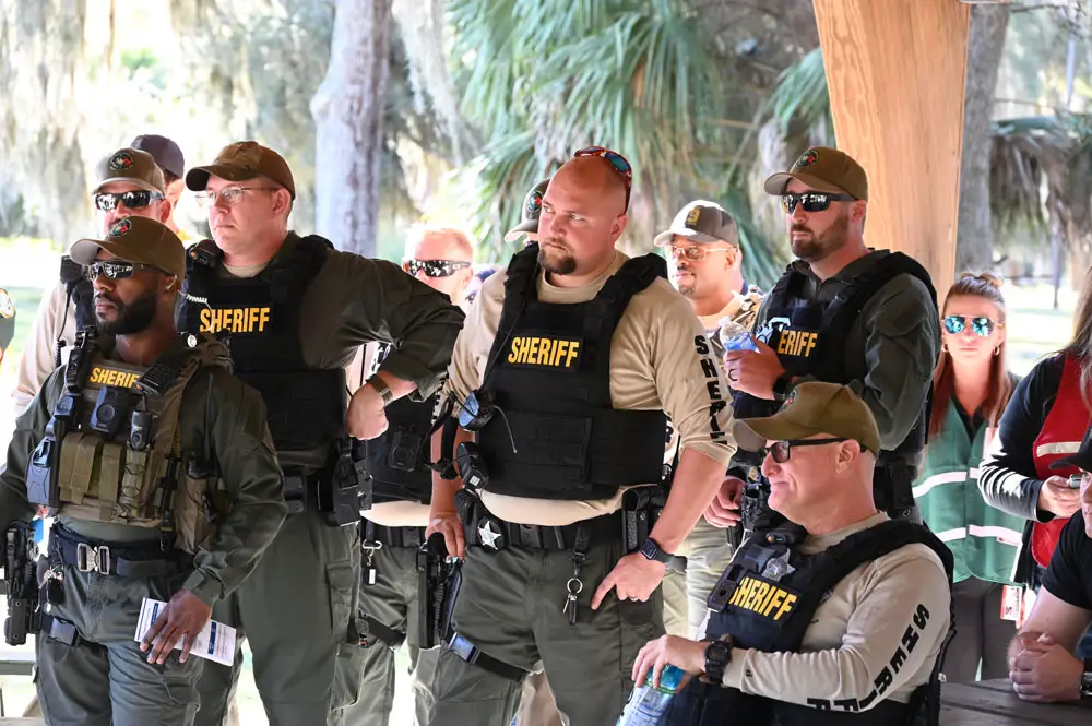 Sheriff's deputies during the morning briefing at Princess Place Preserve, before they were deployed for the exercise. (© FlaglerLive)