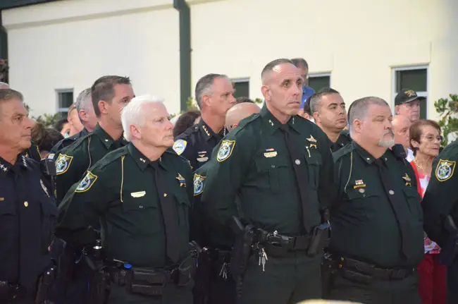 The sheriff's Chief Mark Strobridge, second from left, seen here at last May's memorial for law enforcement officers, presented the sheriff 's pitch for additional deputies to the Palm Coast City Council this morning. (© FlaglerLive)