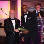 Christian Harrison accepts the Flagler County Sheriff's Office's Deputy of the Year award from Sheriff Rick Staly at the gala. (FCSO)