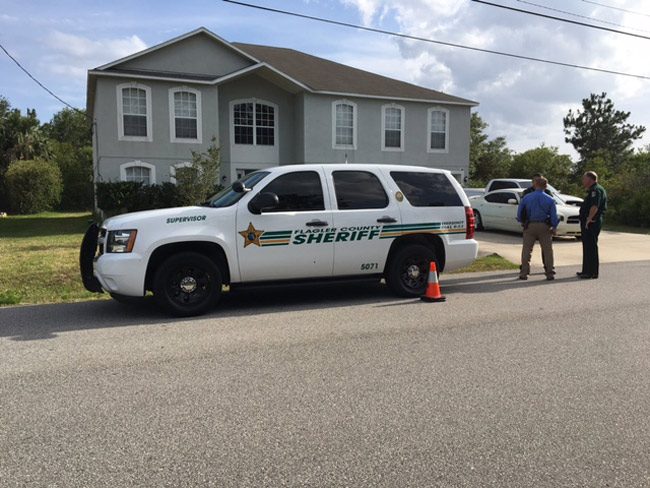 The Flagler County Sheriff's Sergeant's patrol car was shot at, with at least two bullets striking the vehicle. (FCSO)