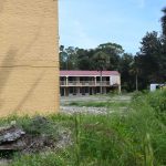 Still derelict after all these years: the old Country earth Inn Motel on Old Dixie Highway. (© FlaglerLive)