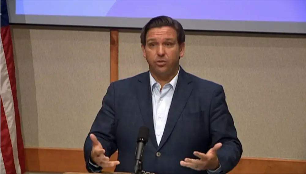 Gov. Ron DeSantis addressing reporters today in Pensacola in a still from a WFLA video posted on the Governor's Facebook page.