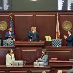 Gov. Ron DeSantis, Senate President Ben Albritton, and House Speaker Daniel Perez stand in front of a joint session of the Florida Legislature to hear the governor’s State of the State address on March 4, 2025. (Photo by Jay Waagmeester/Florida Phoenix)