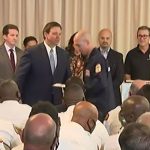 Gov. Ron DeSantis traveled to Surfside, shown here, Jacksonville, and Pensacola to hand out $1,000 bonus checks (paid for with federal COVID aid) to first responders. Source: Screenshot/Florida Channel