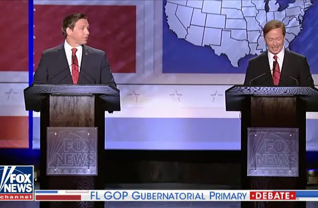 Ron DeSantris, left, and Adam Putnam in their debate in Orlando Thursday evening. 