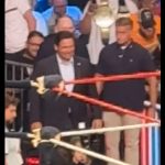 A screen capture from an X video of Gov. Ron DeSantis being jeered at a pro wrestling event.