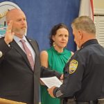 kyle totten Bunnell Police Chief Tom Foster last week swore in Detective Kyle Totten, as his wife, County Judge Andrea Totten, stood by his side--months after roles were reversed, when husband stood at his wife's side during her investiture for county judge.