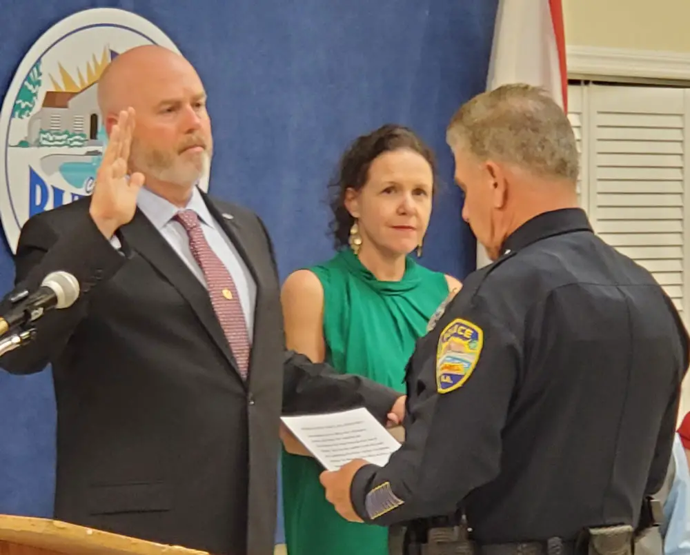 kyle totten Bunnell Police Chief Tom Foster last week swore in Detective Kyle Totten, as his wife, County Judge Andrea Totten, stood by his side--months after roles were reversed, when husband stood at his wife's side during her investiture for county judge. 