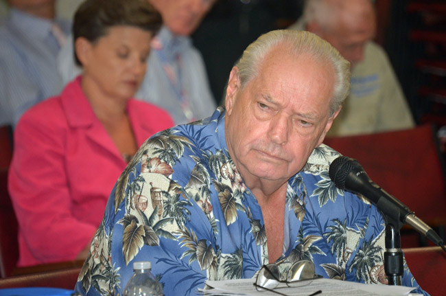 Dick Holmberg during his appearance before a joint panel of three Flagler government agencies today. (© FlaglerLive)