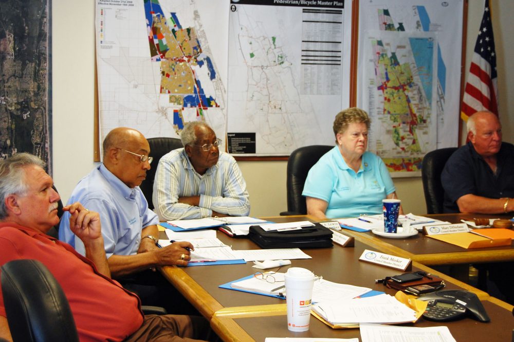 Mary DiStefano with her council colleagues in 2010. From left, Frank Meeker, who died in 2016, Holsey Moorman, Bill Lewis, who died in 2015, and Jon Netts. (© FlaglerLive)