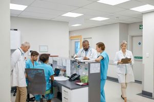 Behind hurried moments are care teams that are working within a health care system that is often stretched too thin.